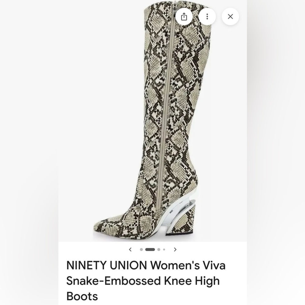 Elegant faux Snakeskin Heeled Boots.